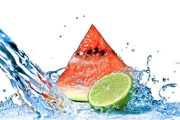 Image showing watermelon with lime and water splash isolated on white