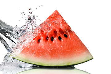 Image showing watermelon and water splash isolated on white