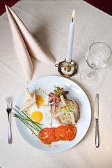 Image showing English breakfast on the plate in restaurant