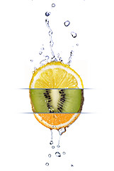 Image showing mix from lemon, orange and kiwi with fresh water drops isolated 