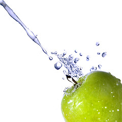 Image showing fresh water splash on green apple isolated on white