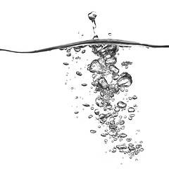 Image showing water splash with bubbles isolated on white