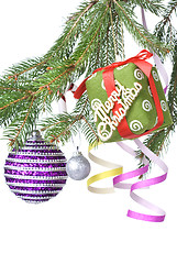 Image showing Christmas balls, gift and decoration on fir tree branch isolated