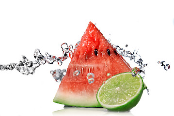 Image showing watermelon, lime and water splash isolated on white