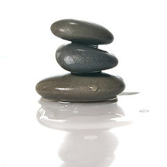 Image showing Spa stones with reflection isolated on white
