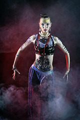 Image showing tribal girl dancing in fog