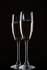 Image showing Champagne in glass isolated on a black background