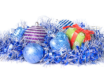 Image showing christmas balls with and gift with decoration isolated on white