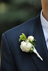 Image showing wedding buttonhole with rose on mans suite