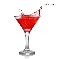 Image showing Red cocktail with splash isolated on white