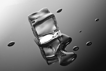 Image showing ice cube with water drops