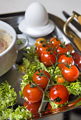 Image showing Cluse up english breakfast with tomato in focus