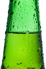 Image showing Green beer bottle with water drops isolated on white