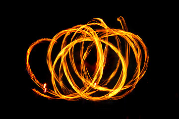 Image showing fire circles on black