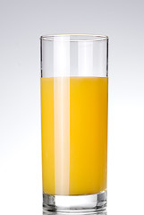Image showing glass of orange juice on white