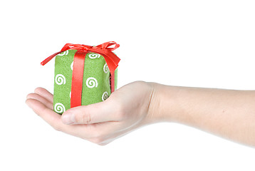 Image showing Hand holding gift isolated on white