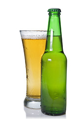 Image showing Beer in bottle and glass isolated on white