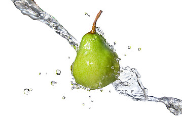 Image showing green pear with water splash isolated on white