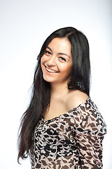 Image showing Portrait of attractive young smiling woman on white