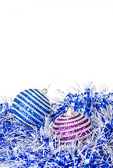 Image showing pink and blue christmas balls with decoration isolated on white