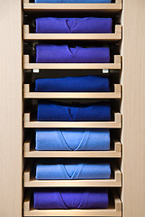 Image showing store shelf with color clothes