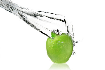 Image showing fresh water splash on green apple isolated on white