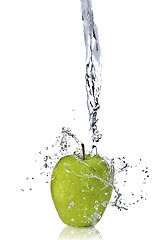 Image showing fresh water splash on green apple isolated on white