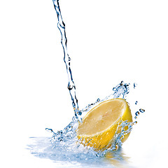 Image showing fresh water drops on lemon isolated on white