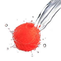 Image showing fresh water splash on red grapefruit isolated on white