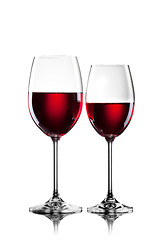 Image showing Red wine in glasses isolated on white