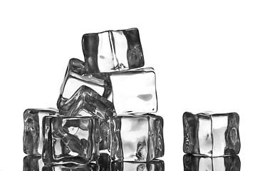 Image showing ice cubes with water drops isolated on white