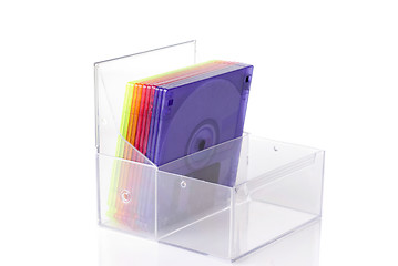 Image showing Color floppy disks in box isolated on white