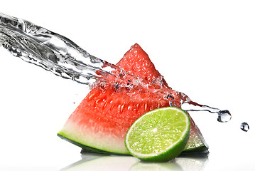 Image showing watermelon, lime and water splash isolated on white