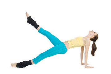 Image showing beautiful girl doing gymnastics on white background