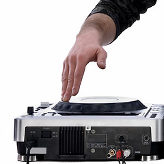 Image showing dj's hand playing on mixer isolated on white