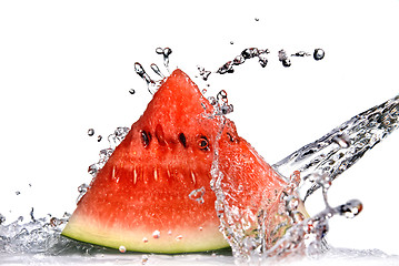 Image showing watermelon and water splash isolated on white