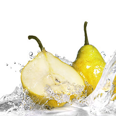 Image showing yellow pear with water splash isolated on white