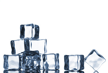 Image showing ice cubes with water drops isolated on white