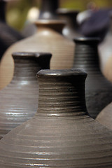 Image showing Hand made clay jugs