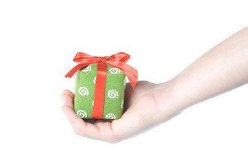 Image showing Hand holding gift isolated on white