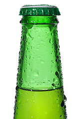 Image showing Green beer bottle with water drops isolated on white