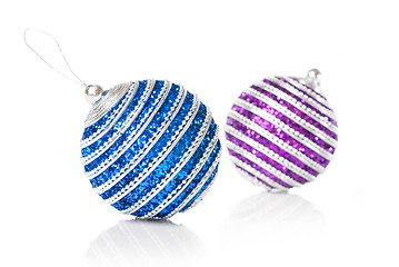 Image showing pink and blue christmas balls isolated on white