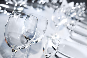 Image showing Glass goblets on white table