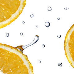 Image showing fresh water drops on orange isolated on white