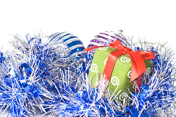 Image showing christmas balls with and gift with decoration isolated on white