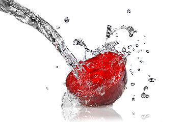 Image showing red beet with water splash isolated on white