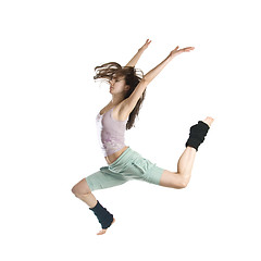 Image showing jumping young dancer isolated on white background