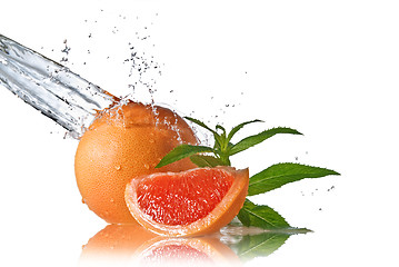 Image showing Water splash on grapefruit with mint isolated on white 