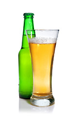 Image showing Beer in bottle and glass isolated on white