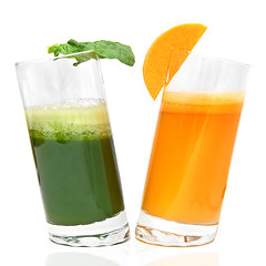 Image showing fresh juices from carrot and parsley in glasses isolated on white